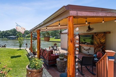 Escape to this stunning lakeside property in Star Harbor on on Star Harbor Golf Club in Texas - for sale on GolfHomes.com, golf home, golf lot