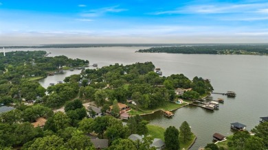 Escape to this stunning lakeside property in Star Harbor on on Star Harbor Golf Club in Texas - for sale on GolfHomes.com, golf home, golf lot