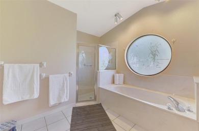 Waterfront Pool Home with Incredible Features in Rotonda West! on Rotonda Golf and Country Club - Long Marsh  in Florida - for sale on GolfHomes.com, golf home, golf lot