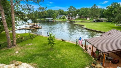 Escape to this stunning lakeside property in Star Harbor on on Star Harbor Golf Club in Texas - for sale on GolfHomes.com, golf home, golf lot