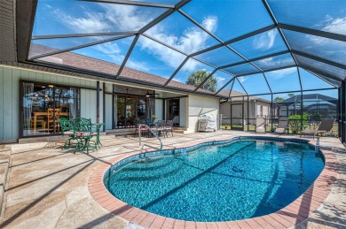 Waterfront Pool Home with Incredible Features in Rotonda West! on Rotonda Golf and Country Club - Long Marsh  in Florida - for sale on GolfHomes.com, golf home, golf lot