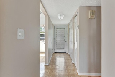 Enjoy peaceful living in this charming 2-bedroom, 2-bathroom on Inverrary Country Club in Florida - for sale on GolfHomes.com, golf home, golf lot