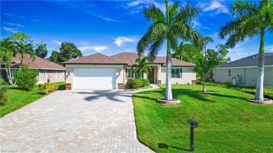 This exceptional pool home situated on the Coral Oaks Golf on Coral Oaks Golf Course in Florida - for sale on GolfHomes.com, golf home, golf lot