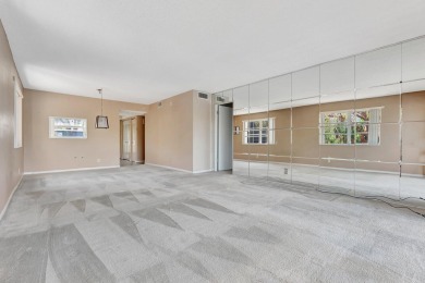 Enjoy peaceful living in this charming 2-bedroom, 2-bathroom on Inverrary Country Club in Florida - for sale on GolfHomes.com, golf home, golf lot