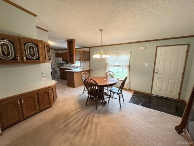 Welcome to this well-maintained 3-bedroom, 2-bath manufactured on Crystal View Municipal Golf Course in Michigan - for sale on GolfHomes.com, golf home, golf lot