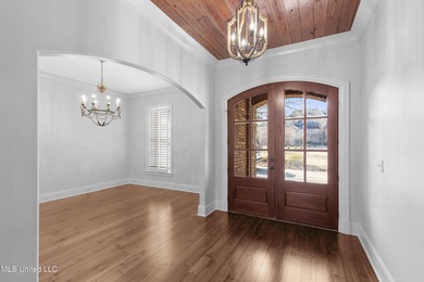 Welcome home to this timeless beauty on Fenwick Circle in on Reunion Golf Club in Mississippi - for sale on GolfHomes.com, golf home, golf lot