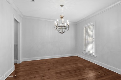 Welcome home to this timeless beauty on Fenwick Circle in on Reunion Golf Club in Mississippi - for sale on GolfHomes.com, golf home, golf lot