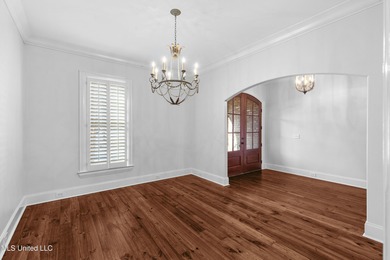 Welcome home to this timeless beauty on Fenwick Circle in on Reunion Golf Club in Mississippi - for sale on GolfHomes.com, golf home, golf lot