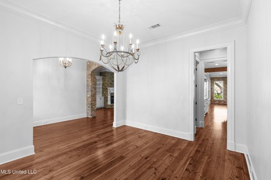 Welcome home to this timeless beauty on Fenwick Circle in on Reunion Golf Club in Mississippi - for sale on GolfHomes.com, golf home, golf lot