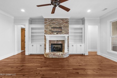 Welcome home to this timeless beauty on Fenwick Circle in on Reunion Golf Club in Mississippi - for sale on GolfHomes.com, golf home, golf lot