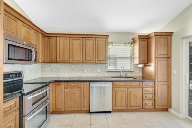 This Newly Updated 3BR/2BA Home Rests in the Highly Desirable on The Golf Club of Jupiter in Florida - for sale on GolfHomes.com, golf home, golf lot