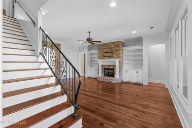 Welcome home to this timeless beauty on Fenwick Circle in on Reunion Golf Club in Mississippi - for sale on GolfHomes.com, golf home, golf lot