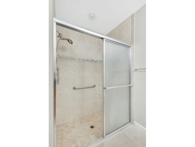 This Newly Updated 3BR/2BA Home Rests in the Highly Desirable on The Golf Club of Jupiter in Florida - for sale on GolfHomes.com, golf home, golf lot