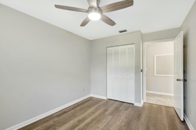 This Newly Updated 3BR/2BA Home Rests in the Highly Desirable on The Golf Club of Jupiter in Florida - for sale on GolfHomes.com, golf home, golf lot