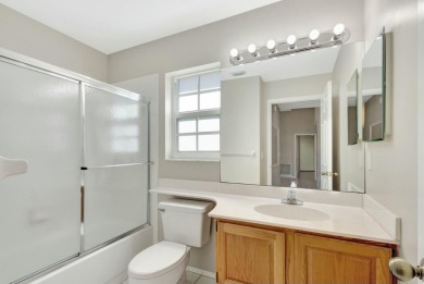 This Newly Updated 3BR/2BA Home Rests in the Highly Desirable on The Golf Club of Jupiter in Florida - for sale on GolfHomes.com, golf home, golf lot