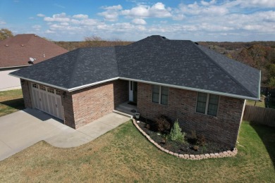 Beautiful walkout basement home near Whispering Oaks Golf Course on Marshfield Country Club in Missouri - for sale on GolfHomes.com, golf home, golf lot