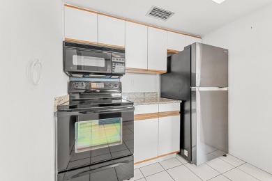 Delightful Challenger model nestled in the active 55+ community on Leisureville Community Golf Course in Florida - for sale on GolfHomes.com, golf home, golf lot