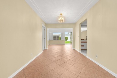 Delightful Challenger model nestled in the active 55+ community on Leisureville Community Golf Course in Florida - for sale on GolfHomes.com, golf home, golf lot