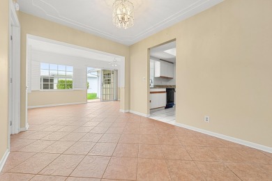 Delightful Challenger model nestled in the active 55+ community on Leisureville Community Golf Course in Florida - for sale on GolfHomes.com, golf home, golf lot