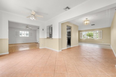 Delightful Challenger model nestled in the active 55+ community on Leisureville Community Golf Course in Florida - for sale on GolfHomes.com, golf home, golf lot