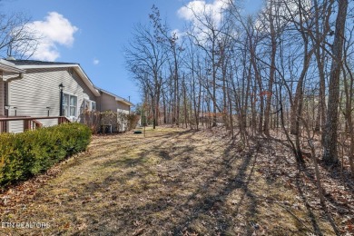This home offers comfort, convenience, and thoughtful design on Druid Hills Golf Club in Tennessee - for sale on GolfHomes.com, golf home, golf lot