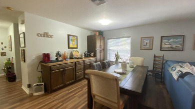 Charming home is situated in the highly sought-after Spanish on Spanish Lakes I in Florida - for sale on GolfHomes.com, golf home, golf lot