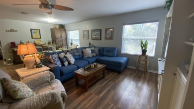 Charming home is situated in the highly sought-after Spanish on Spanish Lakes I in Florida - for sale on GolfHomes.com, golf home, golf lot