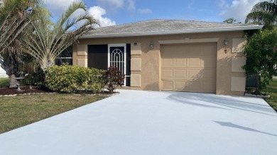 Charming home is situated in the highly sought-after Spanish on Spanish Lakes I in Florida - for sale on GolfHomes.com, golf home, golf lot