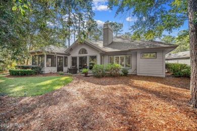 Discover serene golf course living with this beautifully on Oyster Reef Golf Course in South Carolina - for sale on GolfHomes.com, golf home, golf lot