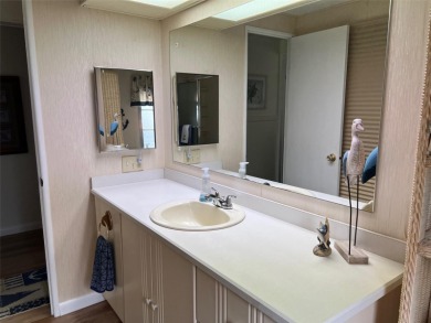 Welcome to this superb 2-bedroom, 2-bathroom home set on the on Palm Hill Golf Club in Florida - for sale on GolfHomes.com, golf home, golf lot