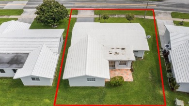 Delightful Challenger model nestled in the active 55+ community on Leisureville Community Golf Course in Florida - for sale on GolfHomes.com, golf home, golf lot