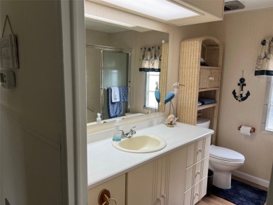 Welcome to this superb 2-bedroom, 2-bathroom home set on the on Palm Hill Golf Club in Florida - for sale on GolfHomes.com, golf home, golf lot