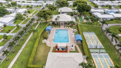 Delightful Challenger model nestled in the active 55+ community on Leisureville Community Golf Course in Florida - for sale on GolfHomes.com, golf home, golf lot