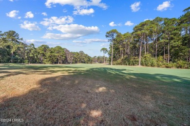 Discover serene golf course living with this beautifully on Oyster Reef Golf Course in South Carolina - for sale on GolfHomes.com, golf home, golf lot