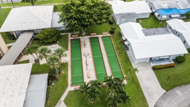 Delightful Challenger model nestled in the active 55+ community on Leisureville Community Golf Course in Florida - for sale on GolfHomes.com, golf home, golf lot