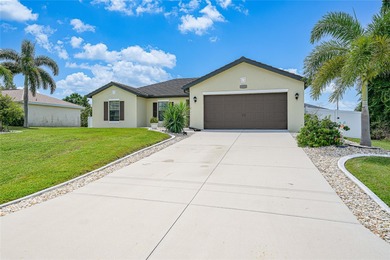 Welcome Home to Effortless Style in Northwest Cape Coral on Burnt Store Golf Club in Florida - for sale on GolfHomes.com, golf home, golf lot