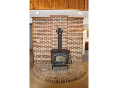 Check out this charming, cozy cabin w/ a fantastic corner lot on Hide-A-Way Hills Golf Club in Ohio - for sale on GolfHomes.com, golf home, golf lot