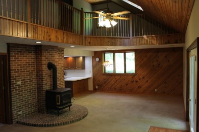 Check out this charming, cozy cabin w/ a fantastic corner lot on Hide-A-Way Hills Golf Club in Ohio - for sale on GolfHomes.com, golf home, golf lot