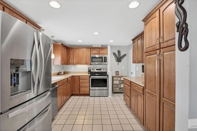 Lovingly maintained 3-bedroom, 2-bath pool home in Venice on Capri Isle Golf Club in Florida - for sale on GolfHomes.com, golf home, golf lot