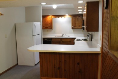 Check out this charming, cozy cabin w/ a fantastic corner lot on Hide-A-Way Hills Golf Club in Ohio - for sale on GolfHomes.com, golf home, golf lot