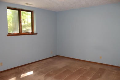 Check out this charming, cozy cabin w/ a fantastic corner lot on Hide-A-Way Hills Golf Club in Ohio - for sale on GolfHomes.com, golf home, golf lot