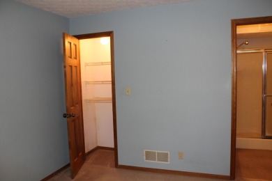 Check out this charming, cozy cabin w/ a fantastic corner lot on Hide-A-Way Hills Golf Club in Ohio - for sale on GolfHomes.com, golf home, golf lot