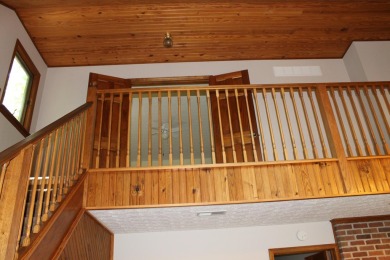 Check out this charming, cozy cabin w/ a fantastic corner lot on Hide-A-Way Hills Golf Club in Ohio - for sale on GolfHomes.com, golf home, golf lot