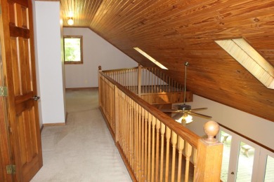 Check out this charming, cozy cabin w/ a fantastic corner lot on Hide-A-Way Hills Golf Club in Ohio - for sale on GolfHomes.com, golf home, golf lot