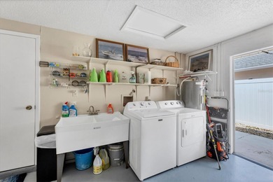 Lovingly maintained 3-bedroom, 2-bath pool home in Venice on Capri Isle Golf Club in Florida - for sale on GolfHomes.com, golf home, golf lot