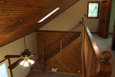 Check out this charming, cozy cabin w/ a fantastic corner lot on Hide-A-Way Hills Golf Club in Ohio - for sale on GolfHomes.com, golf home, golf lot