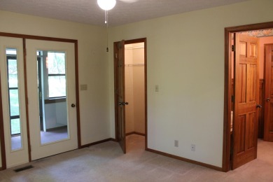 Check out this charming, cozy cabin w/ a fantastic corner lot on Hide-A-Way Hills Golf Club in Ohio - for sale on GolfHomes.com, golf home, golf lot