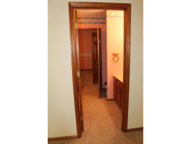 Check out this charming, cozy cabin w/ a fantastic corner lot on Hide-A-Way Hills Golf Club in Ohio - for sale on GolfHomes.com, golf home, golf lot