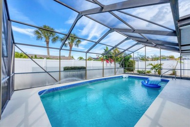 Lovingly maintained 3-bedroom, 2-bath pool home in Venice on Capri Isle Golf Club in Florida - for sale on GolfHomes.com, golf home, golf lot