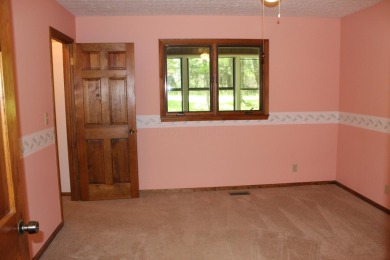 Check out this charming, cozy cabin w/ a fantastic corner lot on Hide-A-Way Hills Golf Club in Ohio - for sale on GolfHomes.com, golf home, golf lot